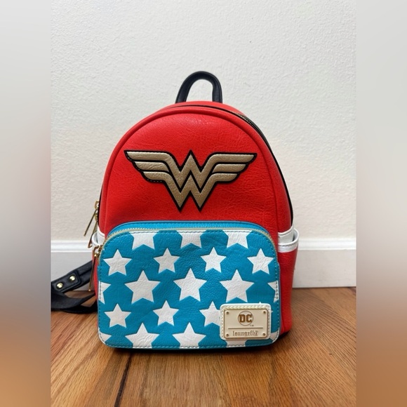 Loungefly Handbags - Loungefly Vintage Design Wonder Woman Cosplay Mini Backpack *Lightly Used* RARE